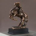 Cowboy bronze Figurine - 11"H X 8.5"W